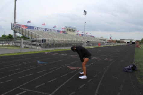 Niya Stephenson, a student athlete at Patriot high school in Nokesville Virginia, is training after school for her upcoming district track meet.