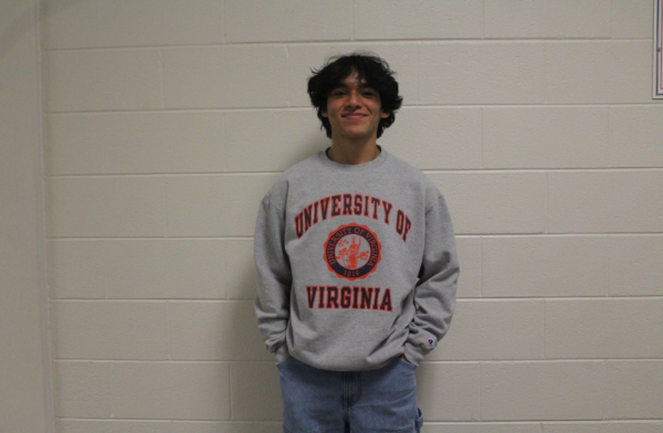 Frankely, Ramirez (‘24) wearing his Quest bridge college match, UVA, sweatshirt. He is very proud and happy to represent UVA.   

 