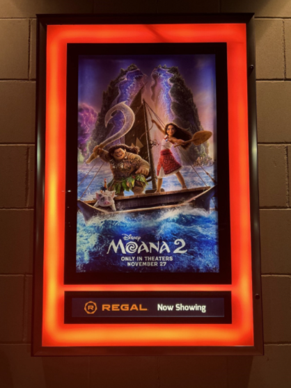 The Moana 2 movie poster displayed at the Regal Virginia Gateway theater. Photo taken by Sarah Rashid. 